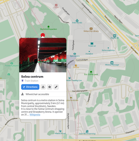 Screenshot showing GNOME Maps showing a place info bubble for Solna Centrum metro station in Solna. Showing a custom network-specific icon (the iconic Stockholm “T” for “tunnelbana” symbol)