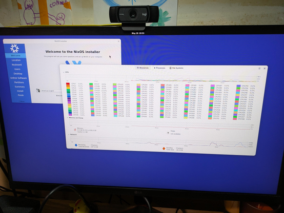 NixOS install window showing resource usage and 128 cores!