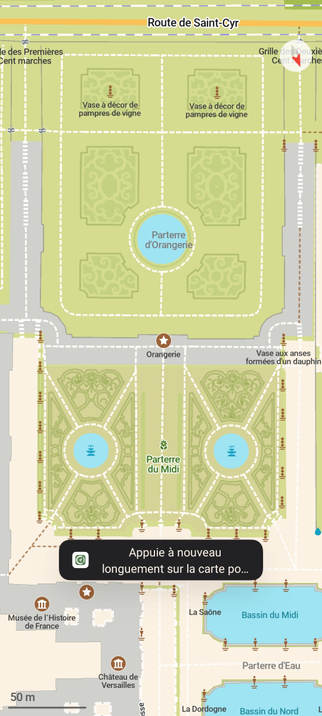 CoMaps screenshot.
A colourful plan centred on a garden bed with delicately drawn hedges and fountains.