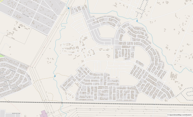 A before and after montage of OpenStreetMap tiles, they show the neigbourhood of Mahatshula filling with detail in. Added are buildings, schools, churches, parks, paths, parking bays, greenzones, leisure areas and the neighbourhood name.