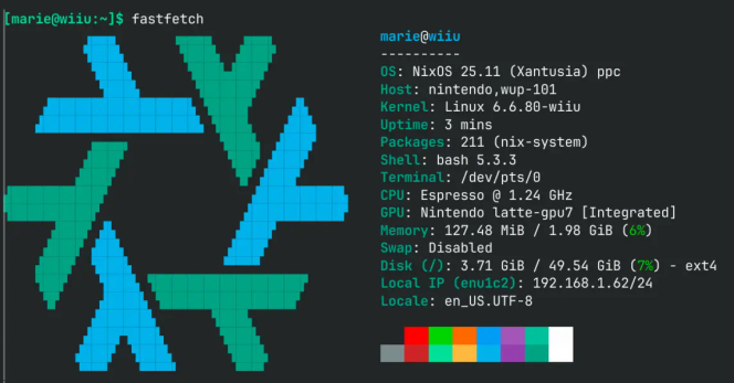 Screenshot of the console output of the command fastfetch. The NixOS logo is displayed as an ascii art on the left.
Text on the right:
marie@wiiu
OS: NixOS 25.11 (Xantusia) ppc
Host: nintendo,wup-101
Kernel: Linux 6.6.80-wiiu
Uptime: 3 mins
Packages: 211 (nix-system)
Shell: bash 5.3.3
Terminal: /dev/pts/0
CPU: Espresso @ 1.24 GHz
GPU: Nintendo latte-gpu7 [Integrated]
Memory: 127.48 MiB / 1.98 GiB (6%)
Swap: Disabled
Disk (/): 3.71 GiB / 49.54 GiB (7%) - ext4
Local IP (enu1c2): 192.168.1.62/24
Locale: en_US.UTF-8